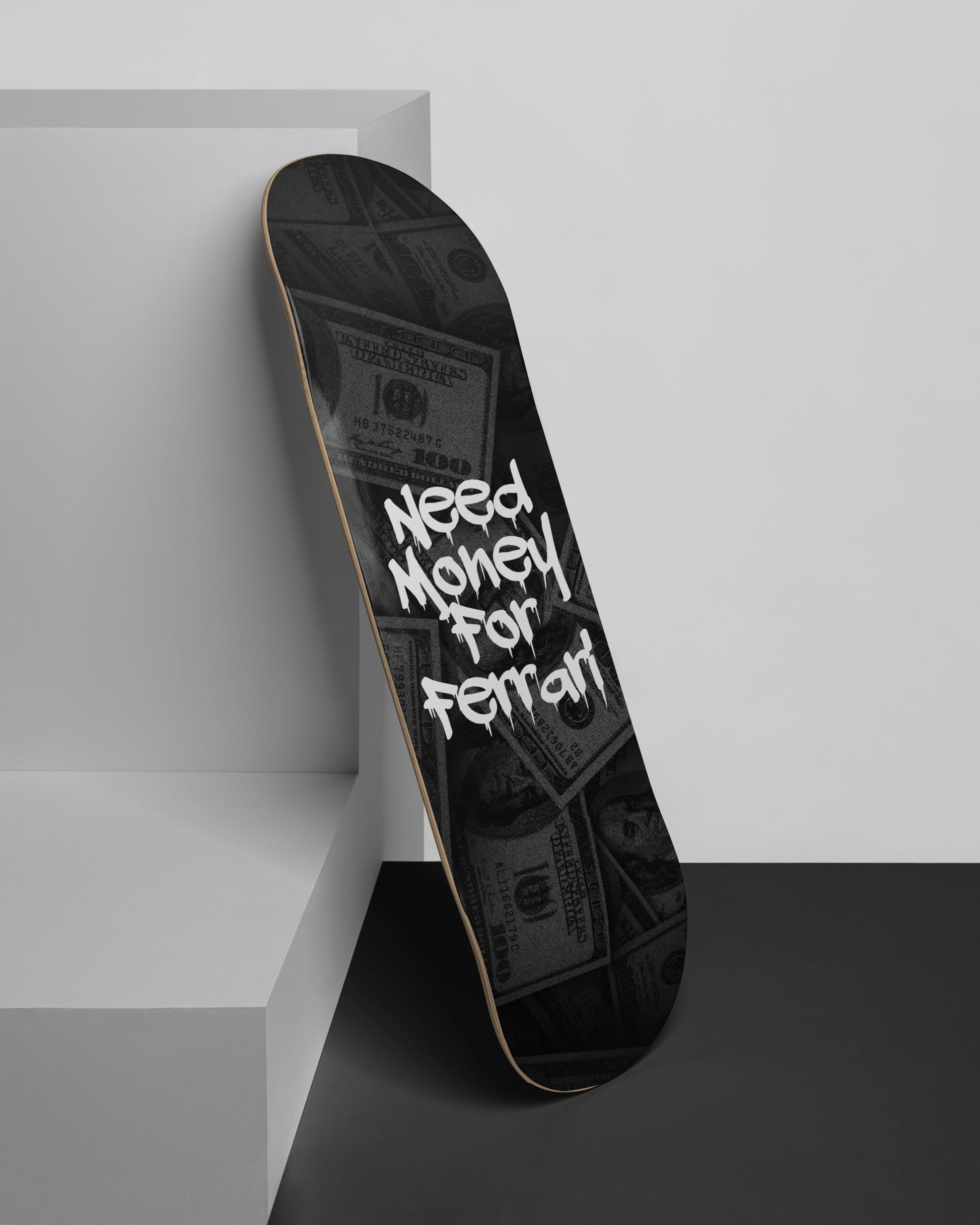 Dark "Need Money for Ferrari" skateboard wall art with white text and a faint currency background on a premium 7-ply maple deck.